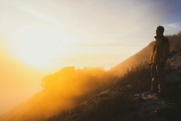 silhouette of mountain during sunset